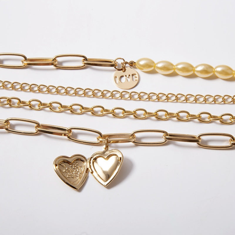 Mixed chain and pearl necklace with Love and Heart pendant