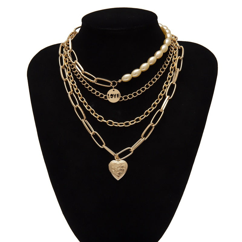 Mixed chain and pearl necklace with Love and Heart pendant